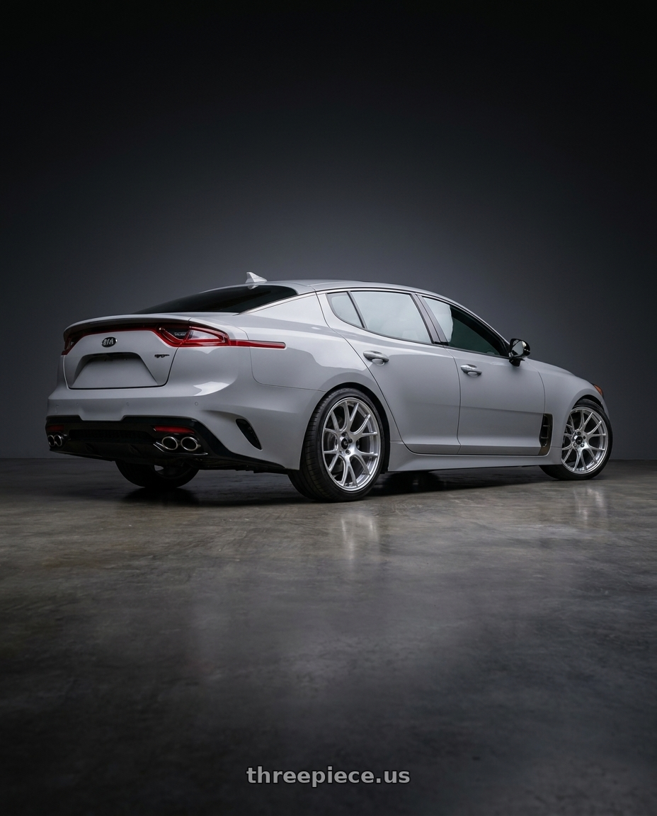 2021 Kia Stinger GT-Line with Konig Forged F1M 5X114.3 18x8.5+35 Ash Silver Knurled Bead wheels rear three quarter view staggered tires
