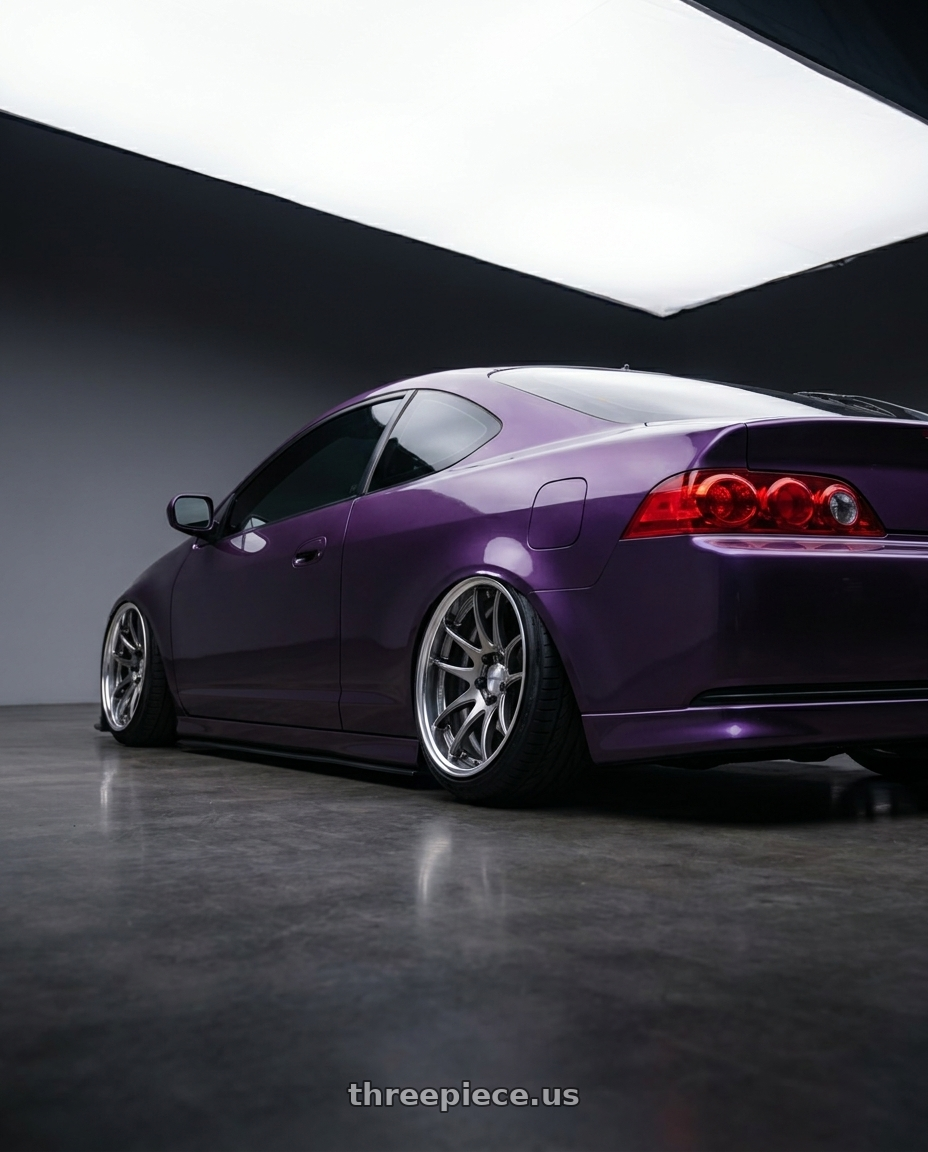 2006 Acura Rsx Type S with Work Cr 2P 5x114.3 18x9.5 +18 GT Silver wheels rear three quarter view slight stretch tires