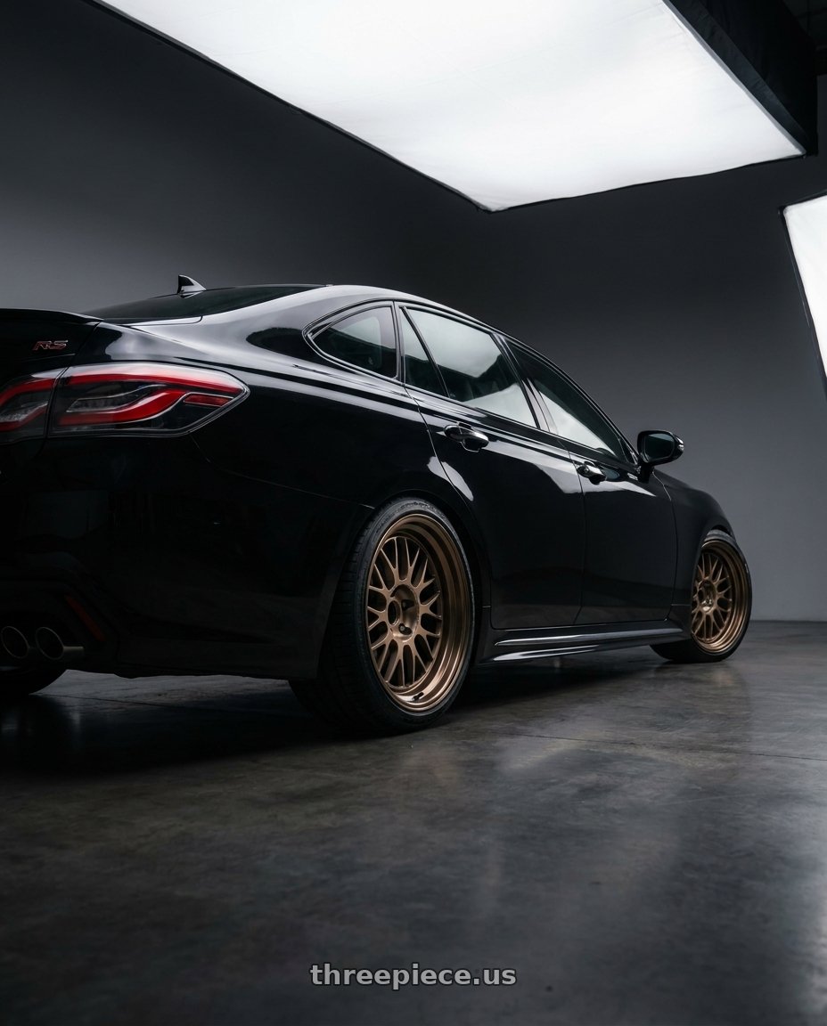 2019 Toyota Crown Rs with Volk Racing 21A 5x112 18X10+0  Bronze wheels rear three quarter view square tires