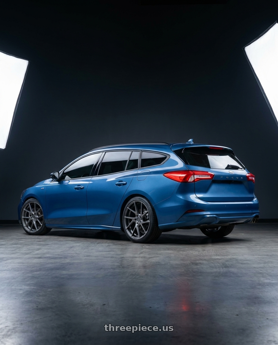 2023 ford Focus with Status JUGGERNAUT 5X150 20X9 +20 CARBON GRAPHITE wheels rear three quarter view square tires
