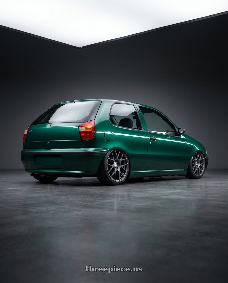 1996 fiat palio verde burmania with TSW NURBURGRING 5X114.3 17X7.5 +45 MATTE GUNMETAL wheels rear three quarter view square tires
