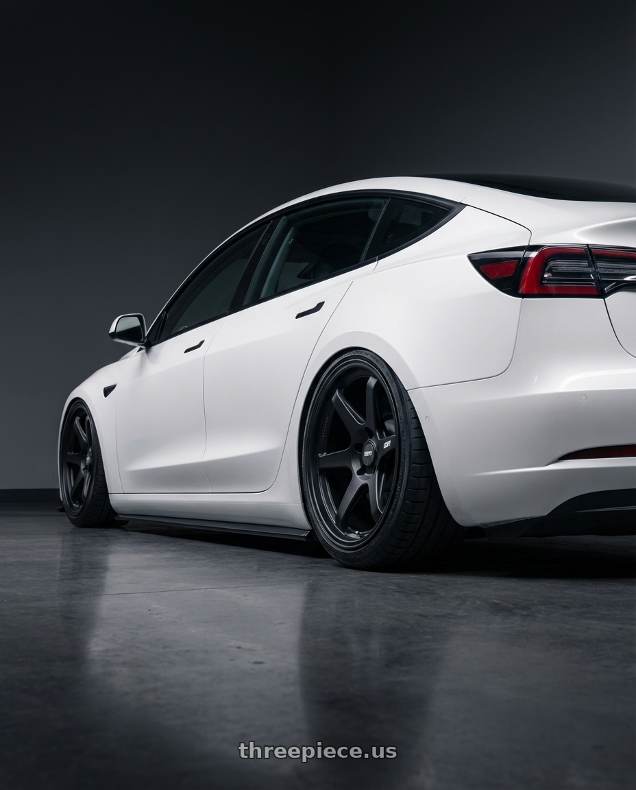 2023 Tesla Model 3 with ESR Wheels APEX SERIES AP6 5x114.3 19x9.5 +22 Matte Black wheels rear three quarter view slight stretch tires