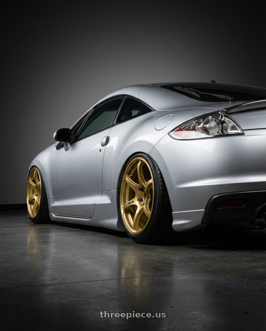 2010 Mitsubishi Eclipse with Advan RGIII 5x114.3 19x9.0+25 Gold wheels rear three quarter view slight stretch tires