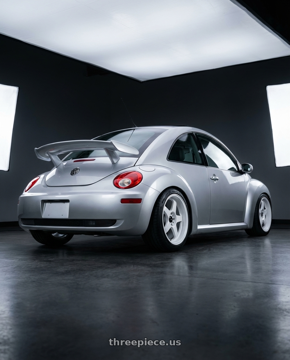 2003 Volkswagen New Beetle Turbo S silver with Vors SP1 5x100/5x114.3 17x8  +35 All White wheels rear three quarter view square tires