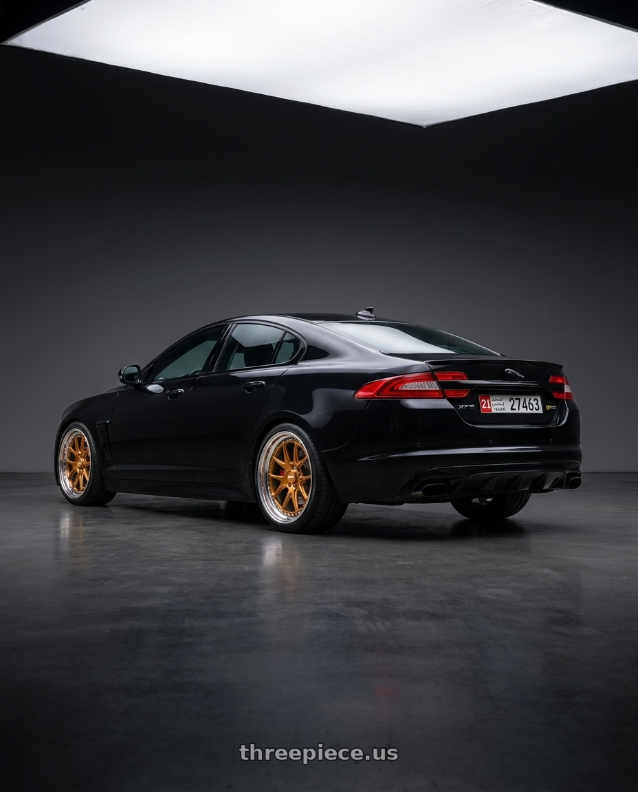 2015 Jaguar XFR-S with CCW CZ05 5x108 20x10.5 +62 Polished wheels rear three quarter view square tires
