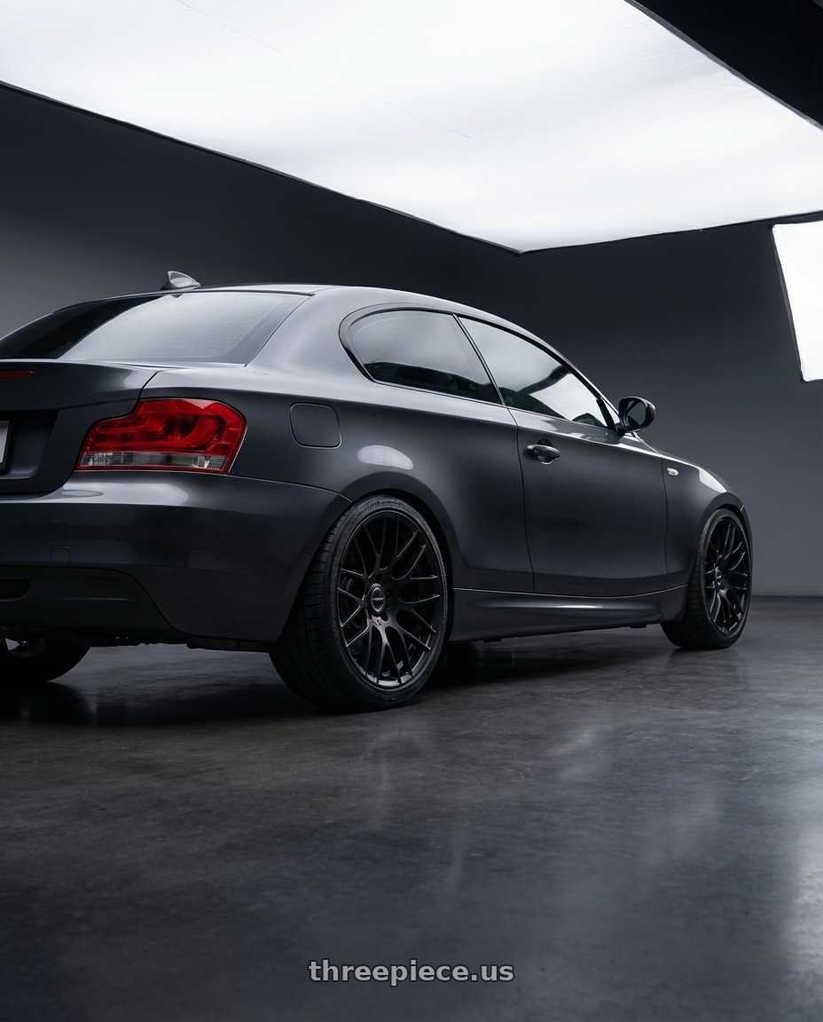 2012 BMW 1 Series E82 with Avant Garde Wheels M359 5X120 18x8.5 +35 Matte Black wheels rear three quarter view square tires