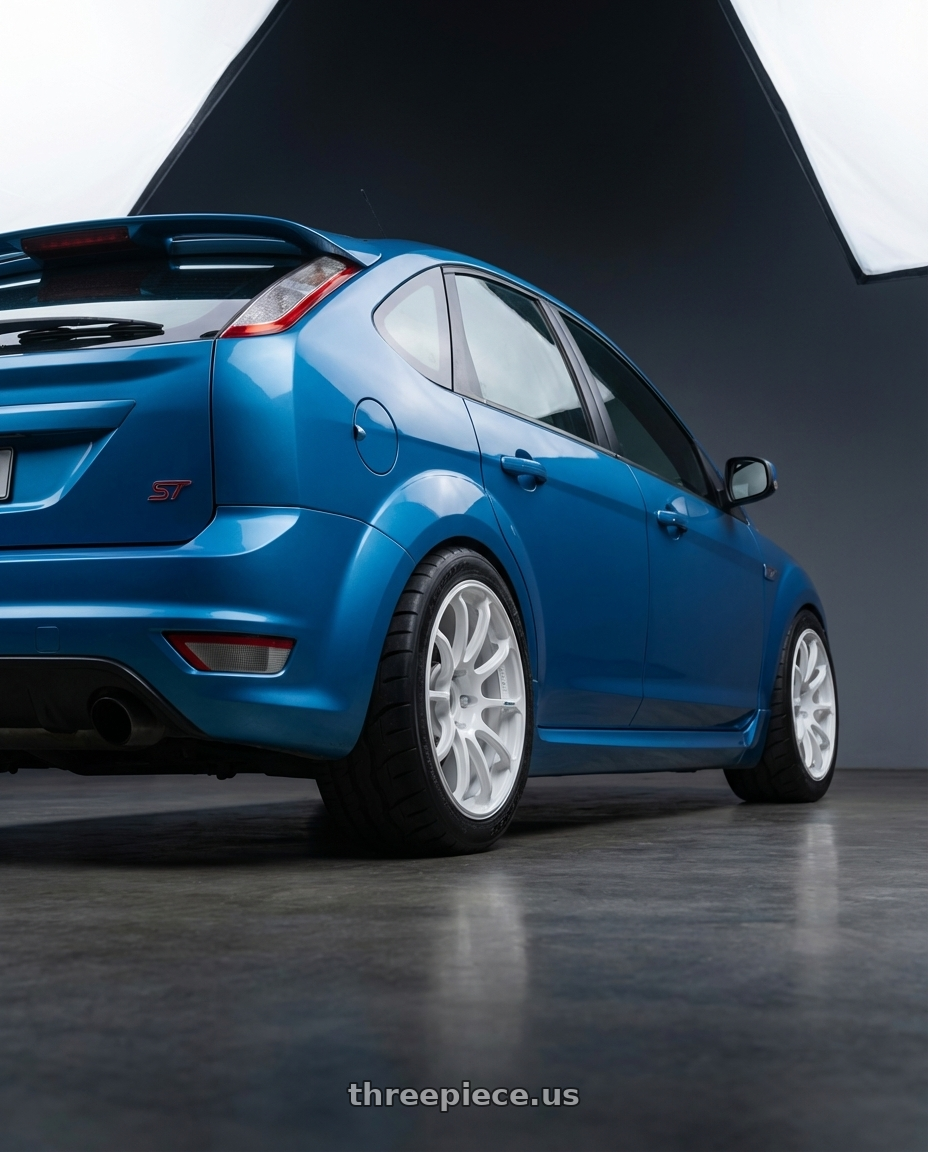 Ford Focus St 2009 with Advan Racing RSIII 5x112 18x7.5 +48 RACING WHITE METALLIC & RING wheels rear three quarter view meaty tires