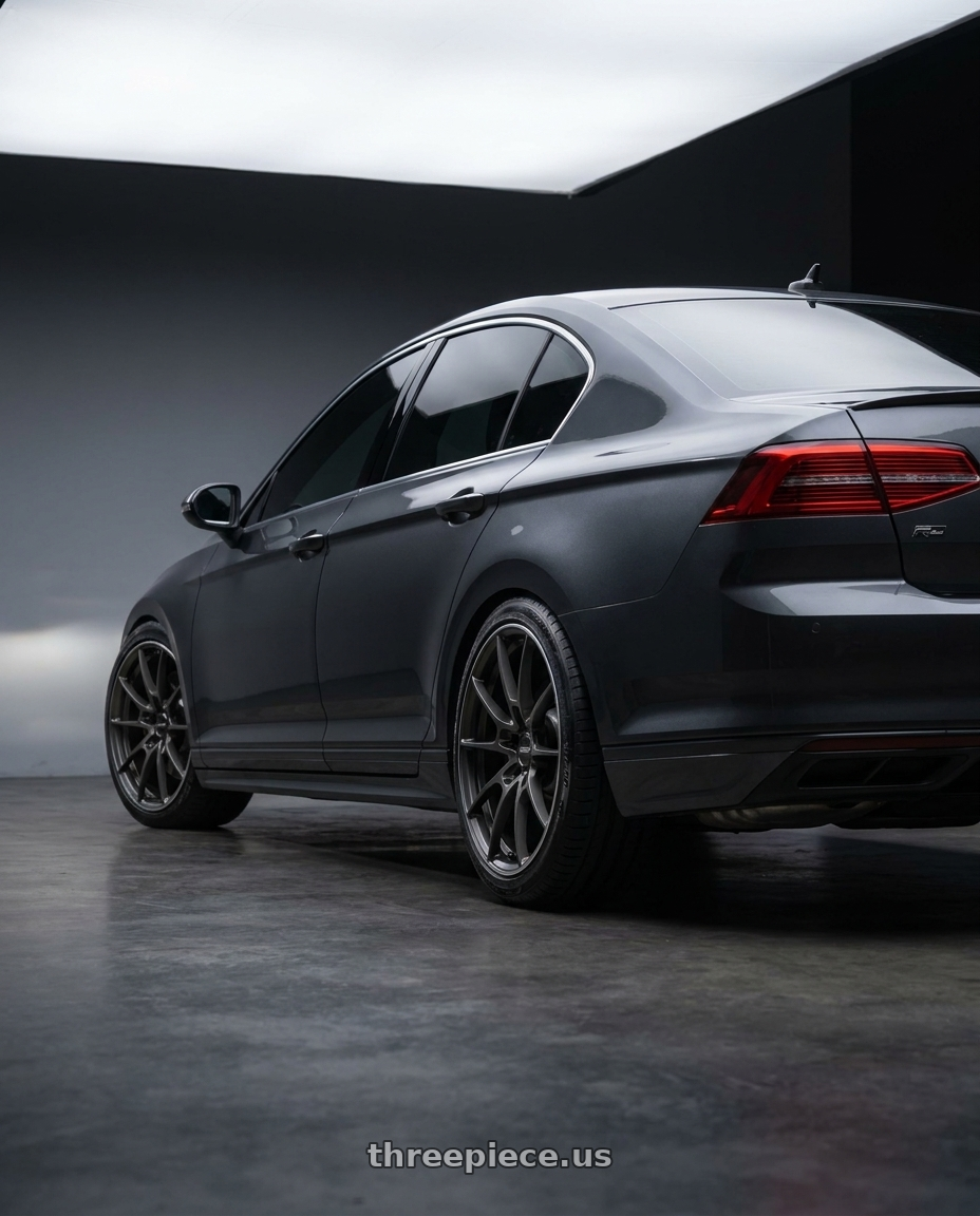 Volkswagen Passat B8.5 2022 with Volk Racing G025 5x114.3 19x8.5+38 Matte Gunblack / Rim Edge DC wheels rear three quarter view slight stretch tires