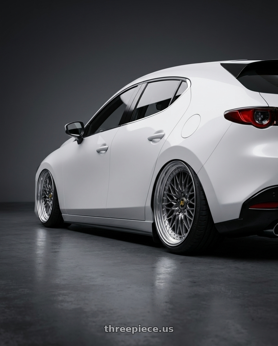 2024 Mazda3 Fastback  with Work Vs-Xv 5x100 18x8.5+34 A Disk Brilliant Silver Black wheels rear three quarter view slight stretch tires