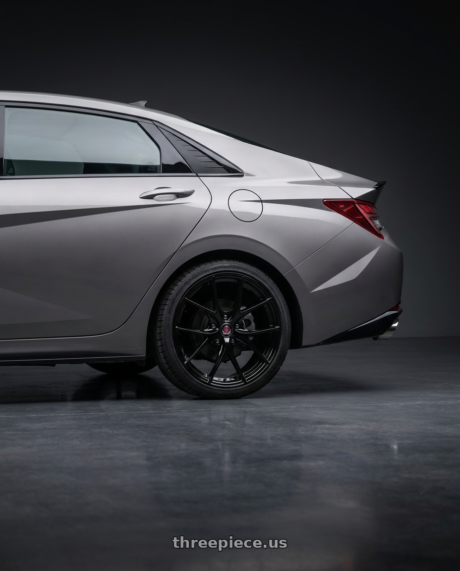 2023 Hyundai Elantra n line with Axe EX34 5x114 18X8+40 GLOSS BLACK wheels rear three quarter view square tires