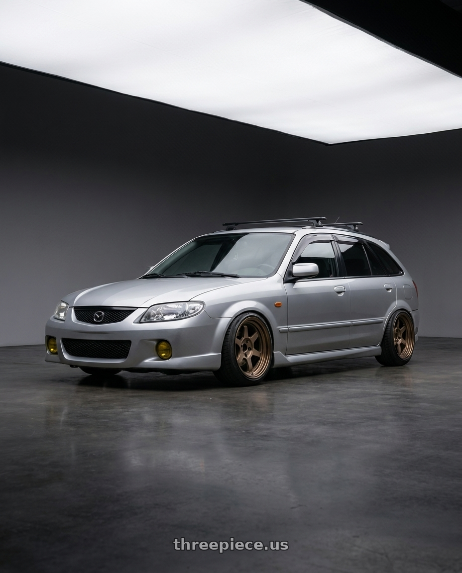 Mazda 323 2000 with Volk Racing TE37V 4x100 17x8.5 +30 BRONZE wheels
