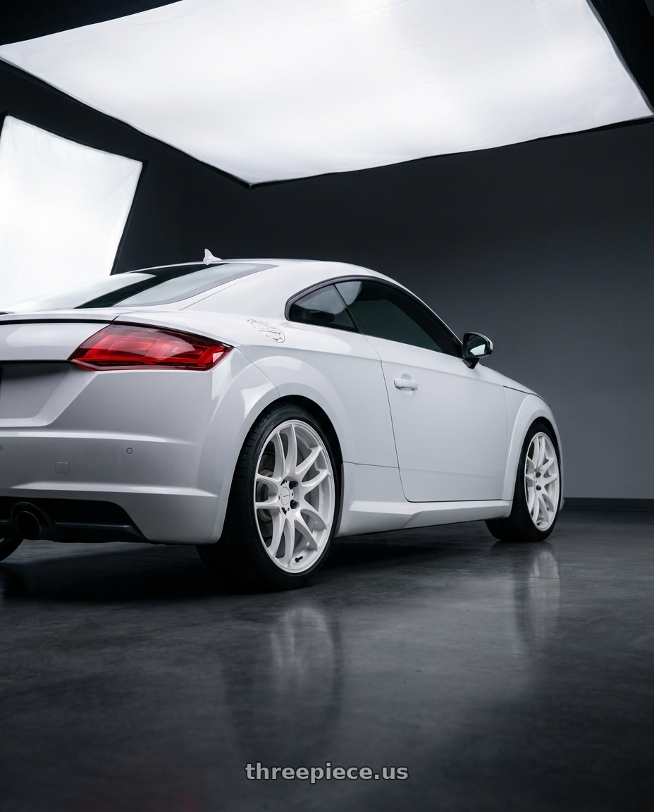 2017 Audi TT with Work Emotion Cr Kiwami 5x112 19x8.5 +42 White wheels rear three quarter view square tires
