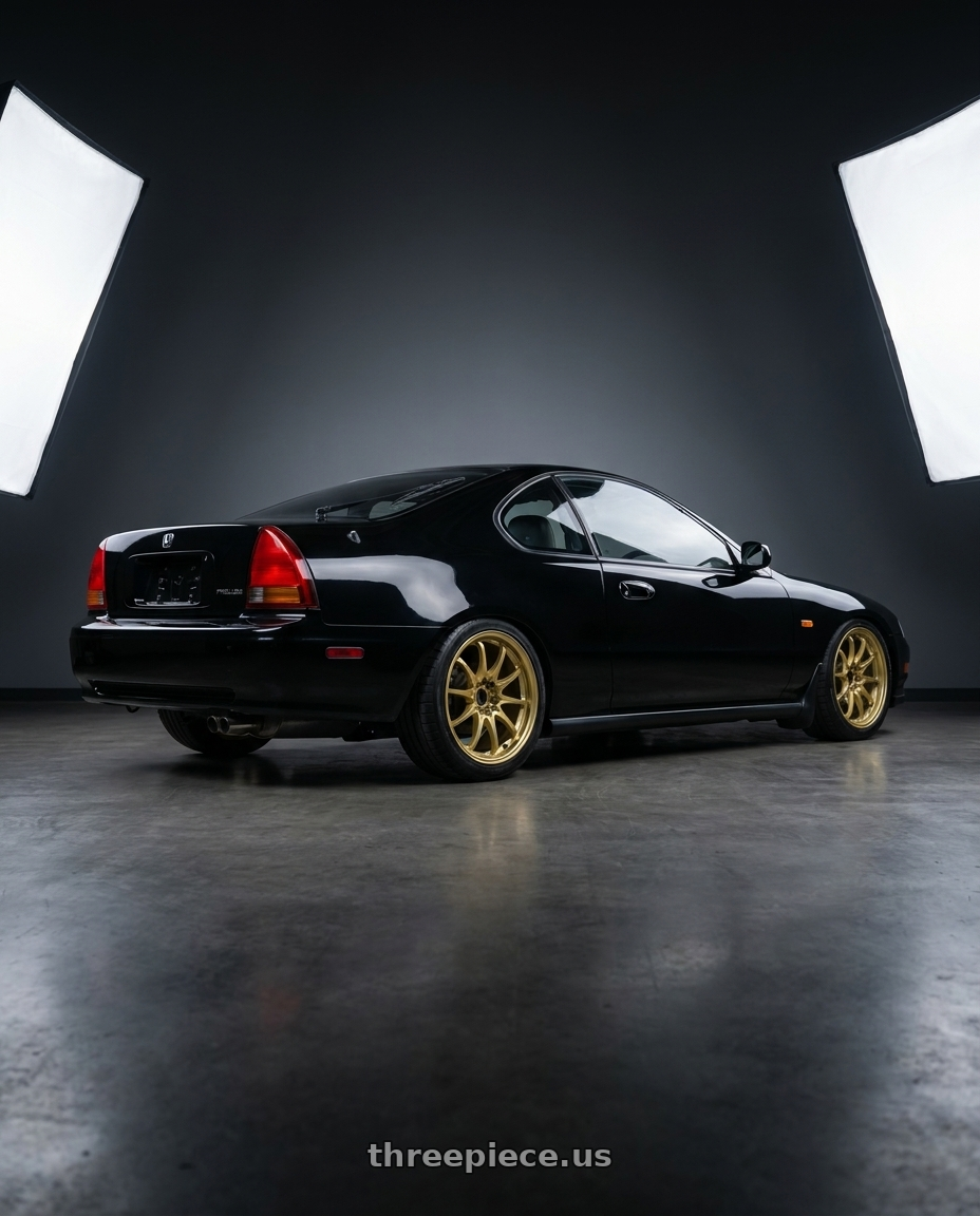 1995 Honda Prelude with Volk Racing CE28N-PLUS 5x114.3 17x9+22 Gold wheels rear three quarter view square tires