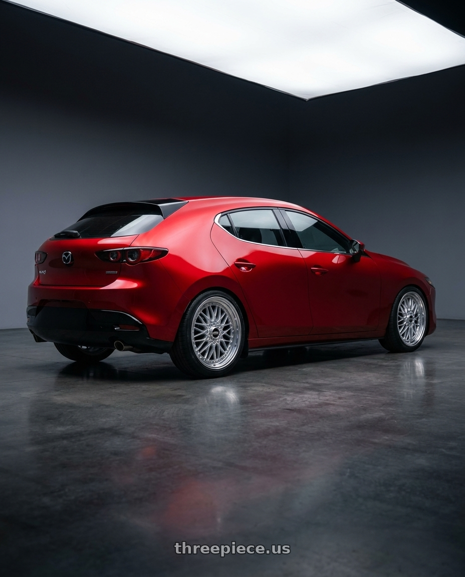 2024 Mazda 3 with BBS Super-RS 5x112 19x9.0+42 Silver wheels rear three quarter view slight stretch tires