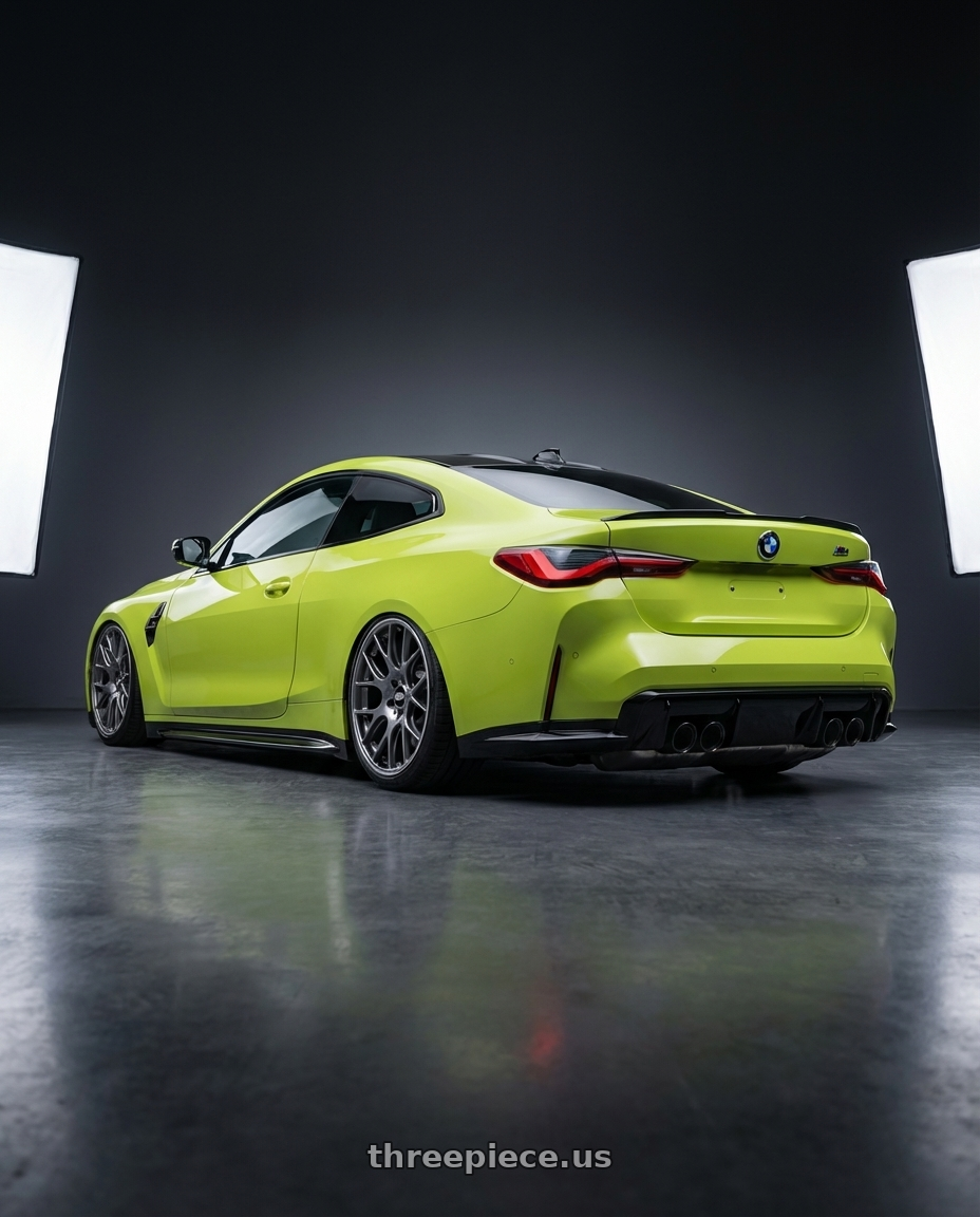 2024 BMW M4 G82 with BBS CH-R 5x112 19x9.5 +35 Satin Titanium Polished Rim Protector wheels rear three quarter view slight stretch tires