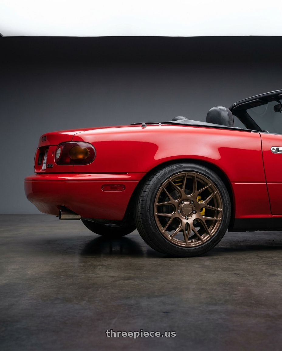 1990 Mazda Mx 5 with MRR FS1 5x112 18x8.5  +25 Gloss Bronze wheels rear three quarter view square tires