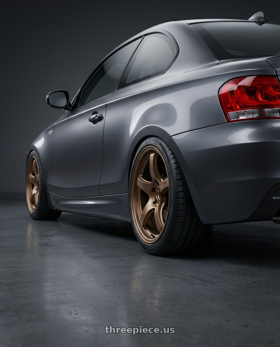 2012 BMW 1 Series E82 with Gram Lights 57CR 5x120 18x9.5+38 Bronze II wheels rear three quarter view square tires