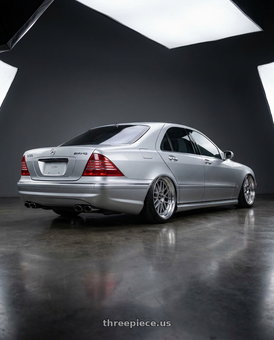 2006 Mercedes S55 AMG with BBS LM 5x112 21x10.0+40 Diamond Silver wheels rear three quarter view extreme stretch tires