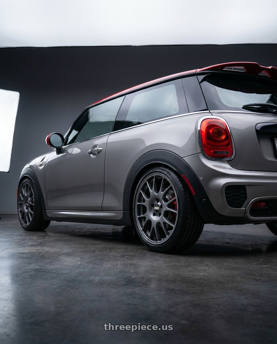 2016 mini cooper JCW with BBS CO 5x112 18x8 +44 Titanium wheels rear three quarter view square tires