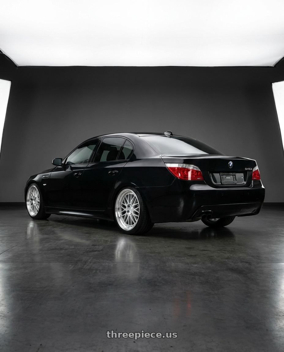 2004 bmw e60 545i with Aodhan AH02 5x120 19x9.5 +35 Silver w/ Machined Lip wheels rear three quarter view slight stretch tires