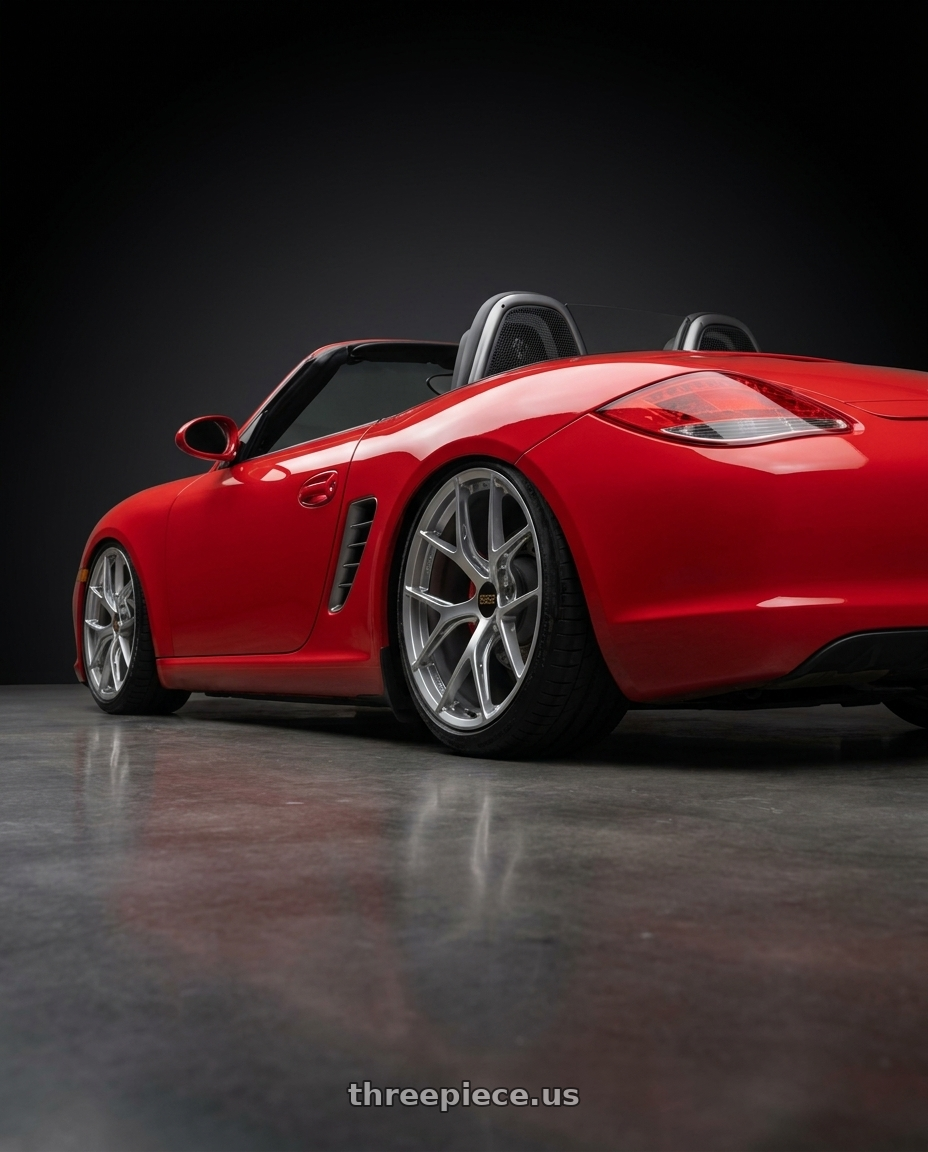 2009 Porsche boxster s with BBS FI-R 5x130 20x11.5 +46 Diamond Silver wheels rear three quarter view slight stretch tires