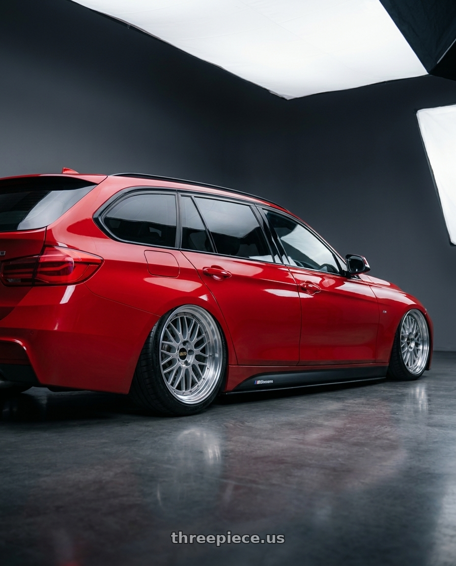 2016 BMW 335D touring with BBS LM 5x114.3 18x9.0+42 Diamond Silver wheels rear three quarter view meaty tires