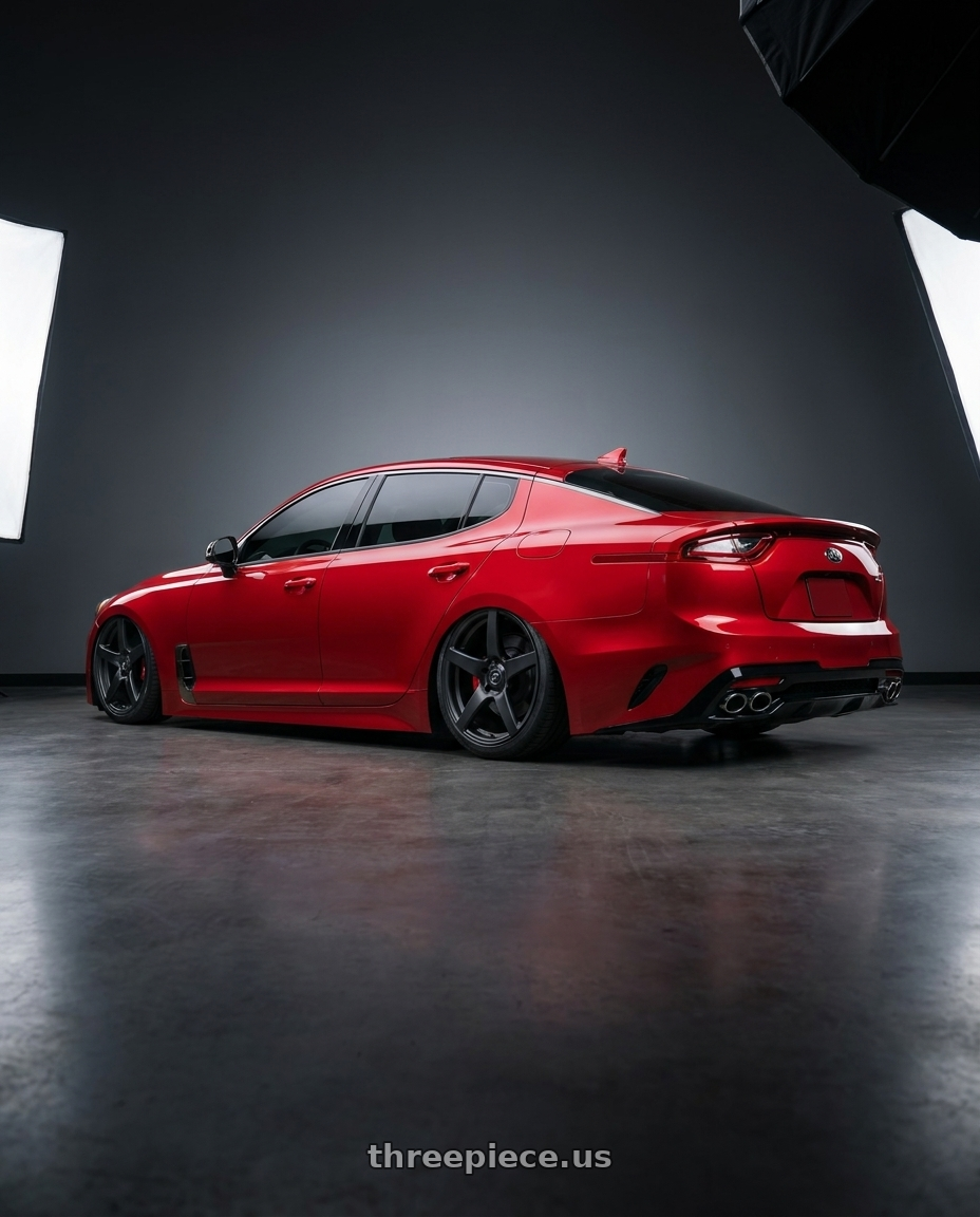 2022 Kia Stinger GT with Forgestar CF5 5x114.3 19x10 +42 Satin Black wheels rear three quarter view slight stretch tires