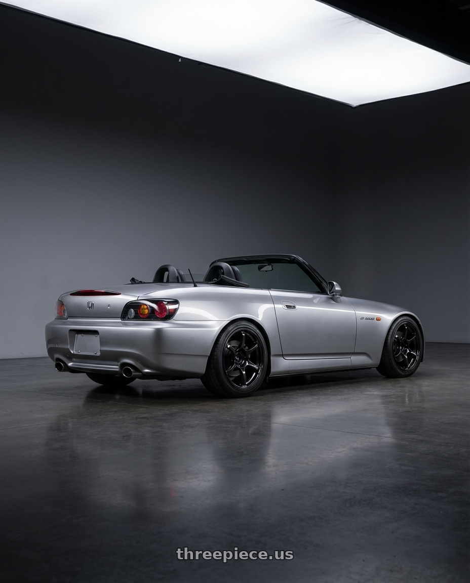 2009 Honda S2000 with Advan RGIII 5x114.3 17x8.5+31 Gloss Black wheels rear three quarter view square tires