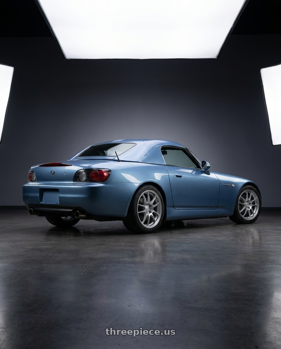 2003 Honda S2000 with Enkei PF01 5x114.3 17x8+50 Silver wheels rear three quarter view square tires