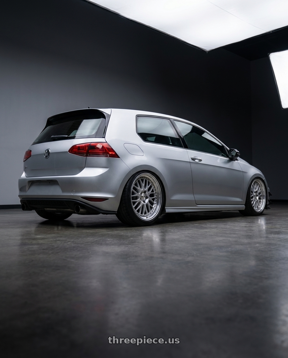 2015 VW GTI with Work Meister L1 3P 5x112 19x9+38 O Disk Matte Silver wheels rear three quarter view square tires
