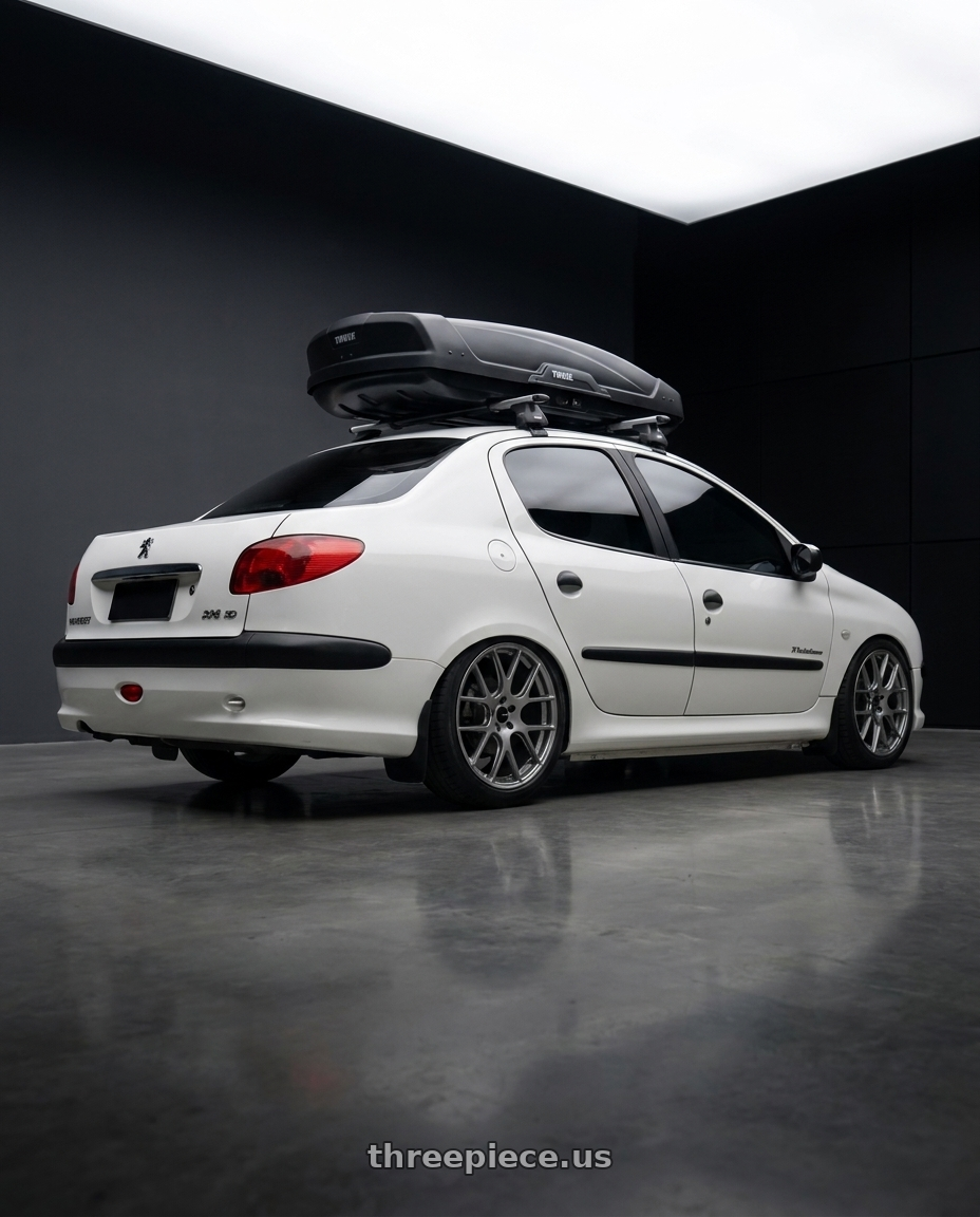 2011 Peugeot 206 SD with Enkei XM-6 5x100 17x7.5+45 Storm Gray wheels rear three quarter view square tires