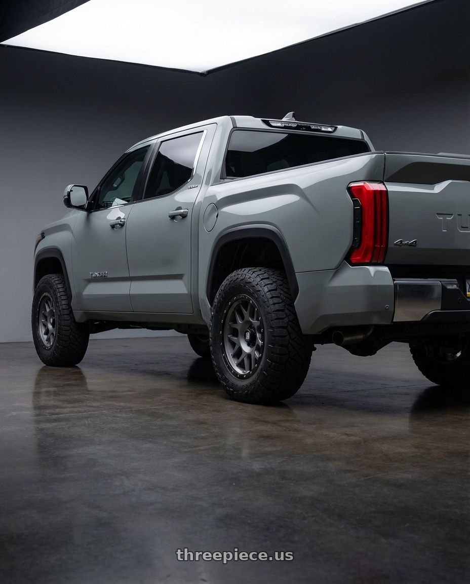 2024 Toyota Tundra with XD XD127 BULLY 6X139.7 20X9 +0 MATTE GRAY BLACK RING wheels rear three quarter view meaty tires