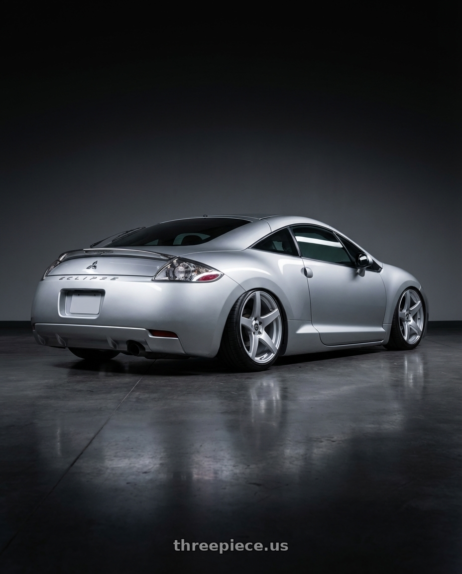 2010 Mitsubishi Eclipse with Forgestar CF5 5x114.3 19x9.5 +29 Gloss Silver wheels rear three quarter view slight stretch tires