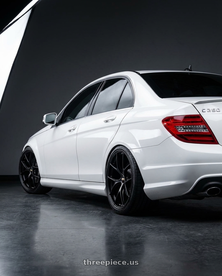 2012 w204 c250 with BBS RI-D 5x112 20x9.5 +10 Matte Black wheels rear three quarter view slight stretch tires