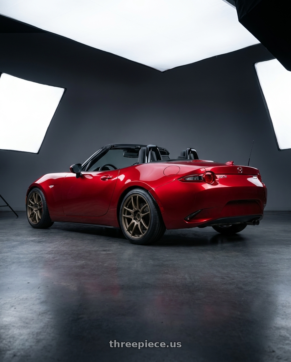 2024 mazda mx5 with Work Emotion Cr Kiwami 4x100 17x7 +38 Matte Bronze wheels rear three quarter view square tires