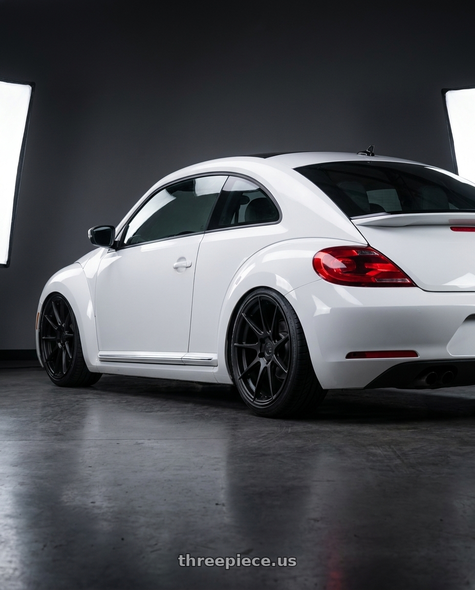 2016 Volkswagen Beetle Turbo with Aodhan AH09 5x112 18x9.5 +35 Matte Black wheels rear three quarter view slight stretch tires