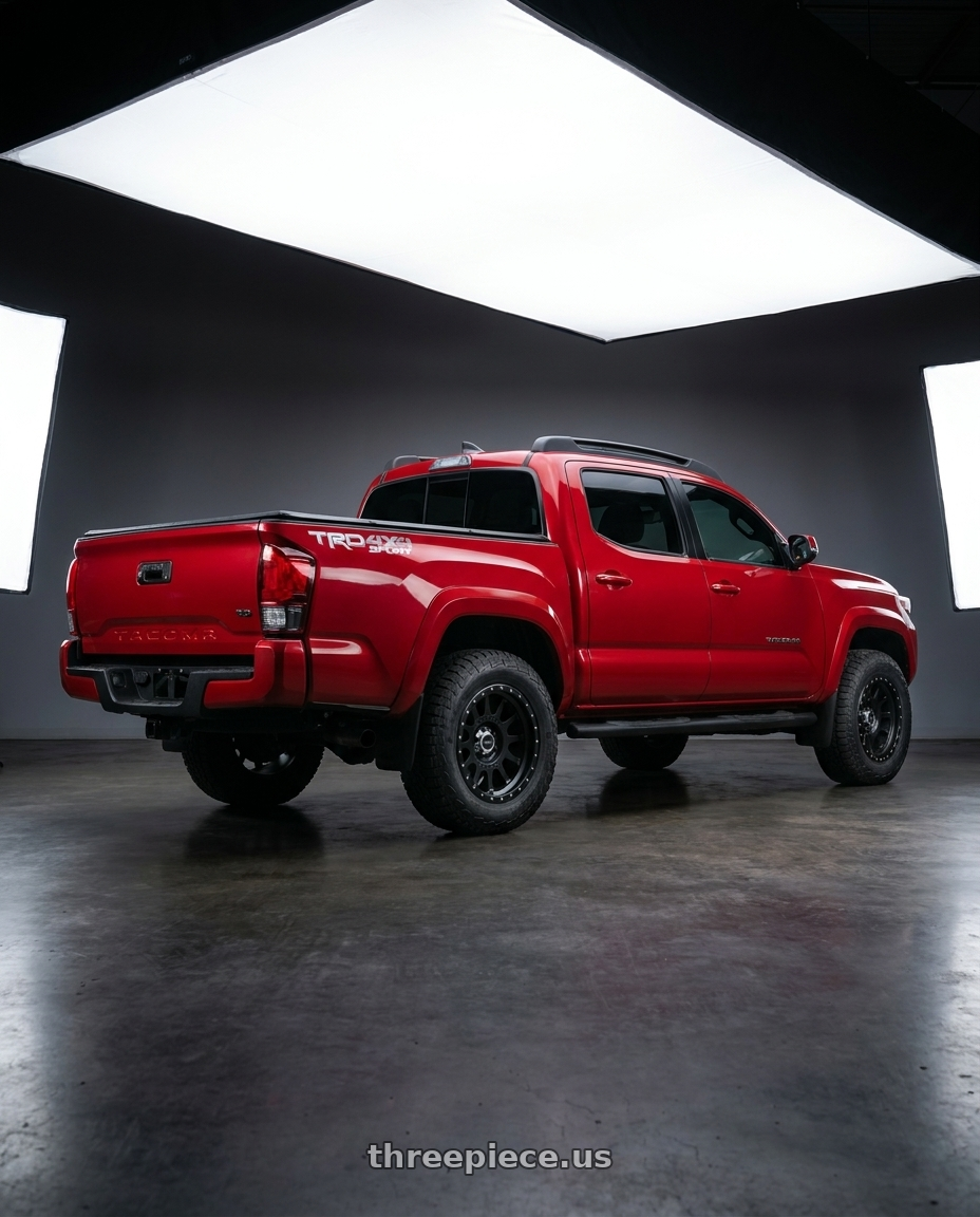 2016 Tacoma TRD Sport with Method Race Wheels 605B NV 8X170 20x9 -12 MATTE BLACK wheels rear three quarter view square tires