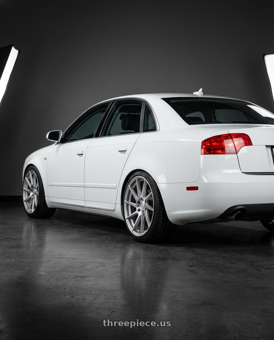 2010 Audi A4 B7 with Aodhan AH09 5x112 18x8.5 +35 Gloss Silver Machined Face wheels rear three quarter view square tires