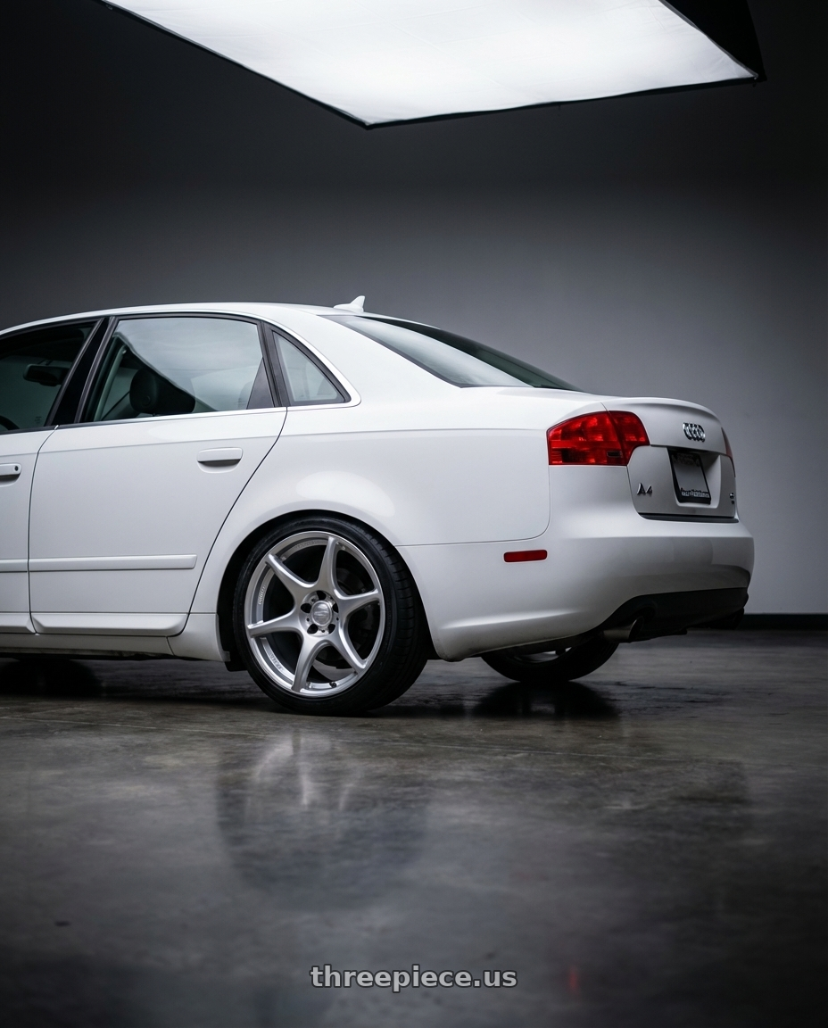 2010 Audi A4 B7 with Kansei K11S Tandem 5X112 18x8.5 35 Hyper Silver wheels rear three quarter view square tires