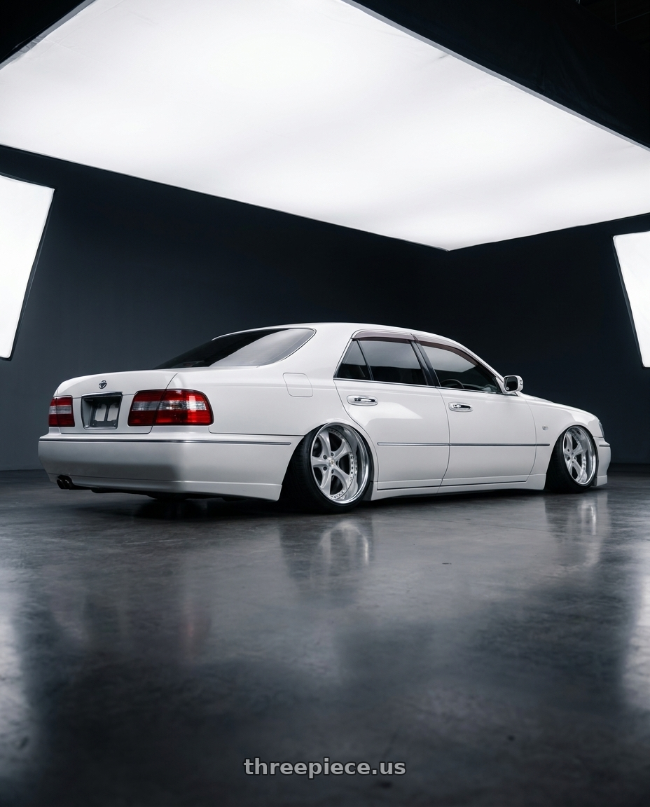 1996 nissan cima with Work Wheels VS-KF 5X114.3 19x11.5-11 Light Grey Silver O Disk FULL REVERSE wheels rear three quarter view extreme stretch tires