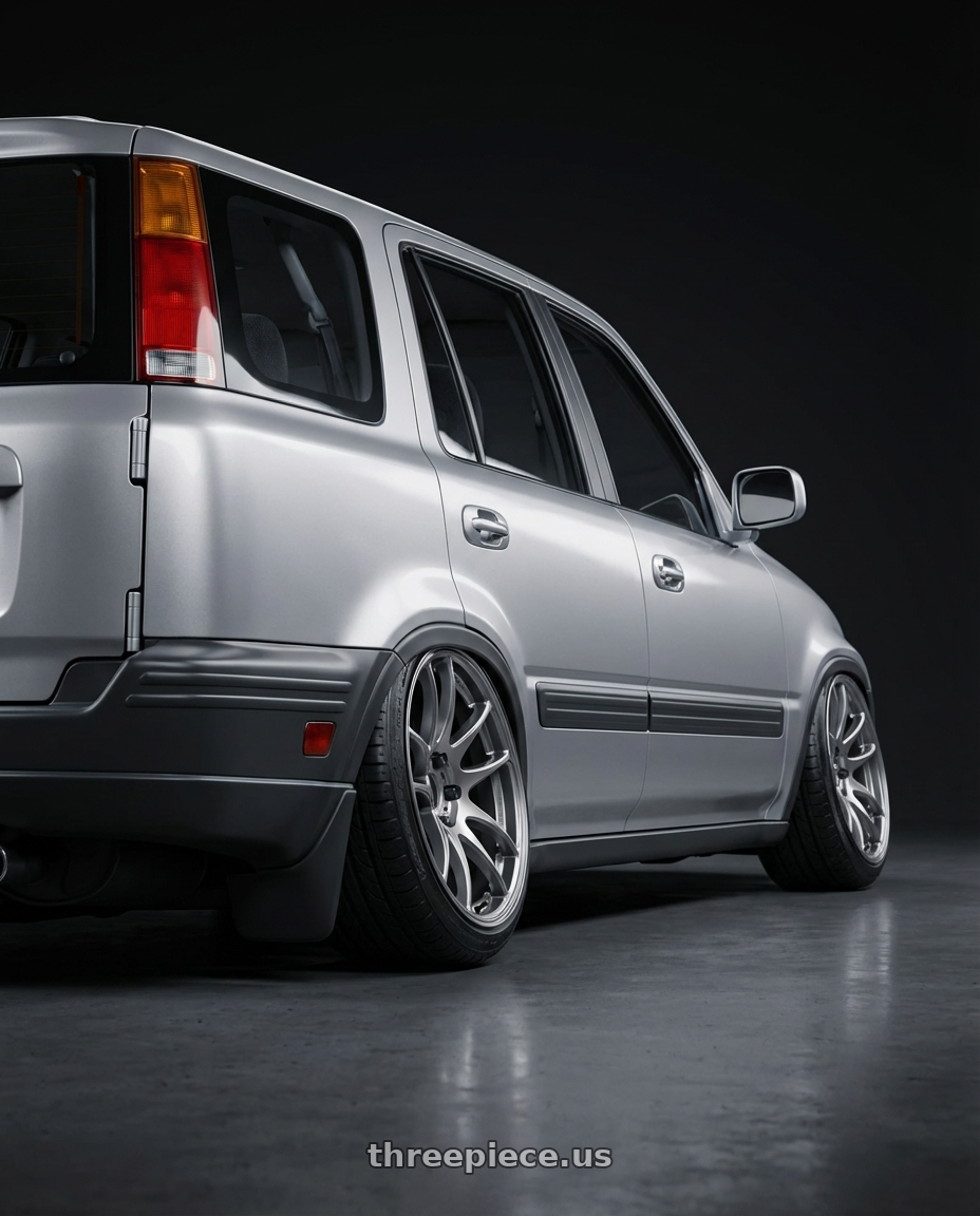 1999 Honda CR-V with Work Emotion Cr Kiwami 4x100 17x7 +38 Gt Silver wheels rear three quarter view extreme stretch tires