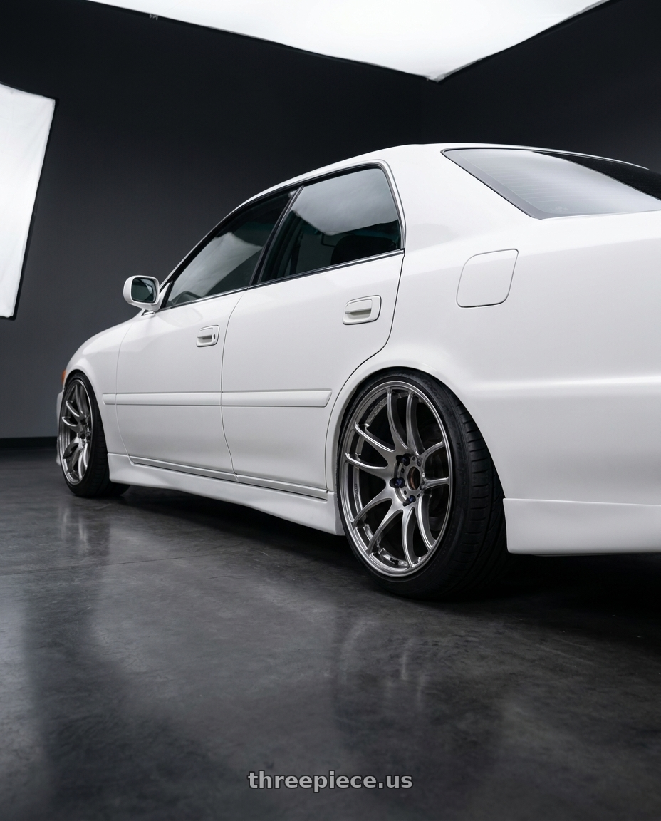 1996 Chaser Tourer V with Work Emotion Cr Kiwami 5x100 18x9.5 +12 Gt Silver wheels rear three quarter view slight stretch tires