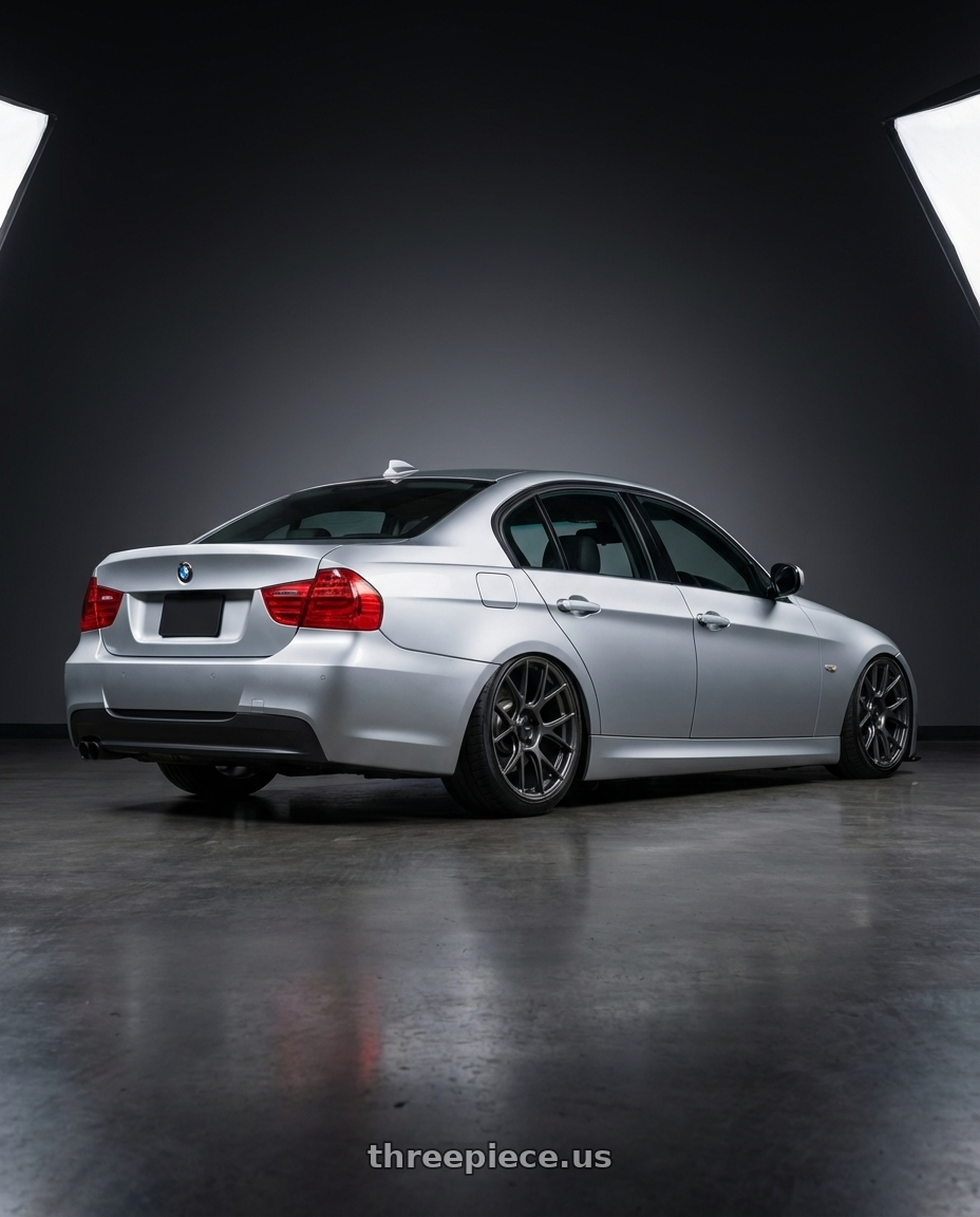 2012 BMW 3 Series E92 with Konig Ampliform 5x120 19x10+28 Dark Metallic Graphite wheels rear three quarter view slight stretch tires