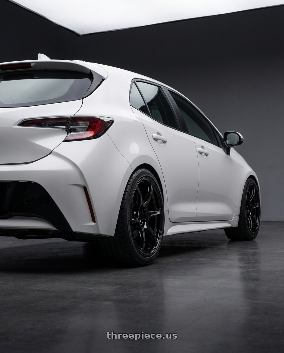 2023 Toyota Corolla Hatchback with Advan RGIII 5x114.3 18x10+35 Gloss Black wheels rear three quarter view square tires