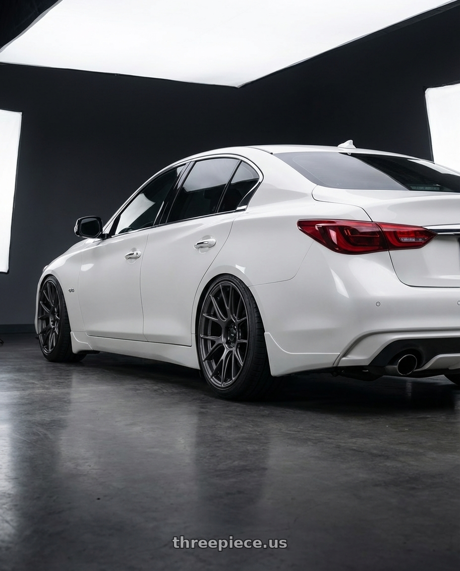 2020 Infiniti Q50 with Konig Ampliform 5x114.3 20x9.5+35 Dark Metallic Graphite wheels rear three quarter view slight stretch tires