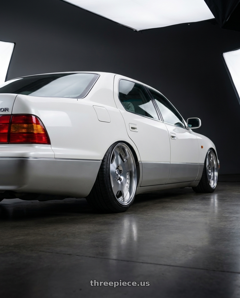 2000 toyota celsior white with Work Lanvec Ld1 5x114.3 18x7.5+45 O Disk Machine Silver Polish wheels rear three quarter view slight stretch tires