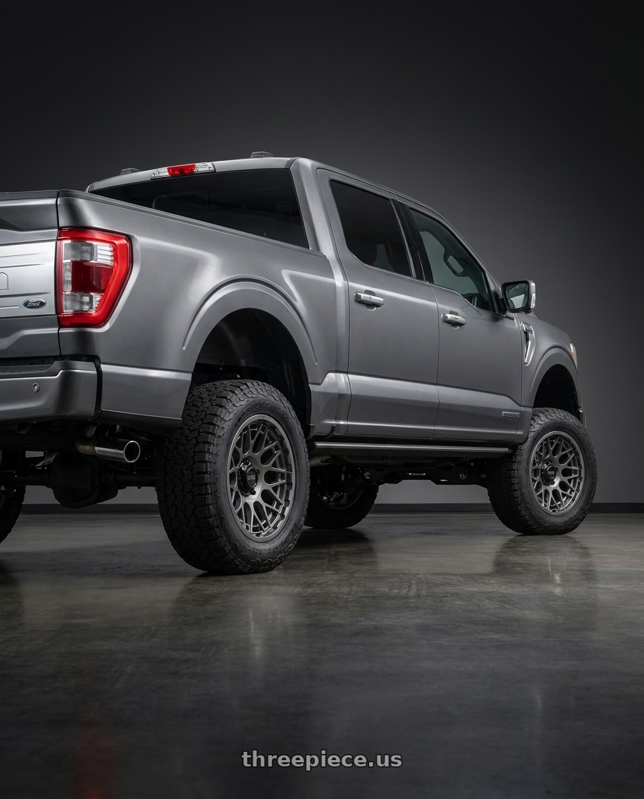 2023 Ford F150 with KMC KM722 TECHNIC 6X135 18X9 +18 ANTHRACITE wheels rear three quarter view square tires