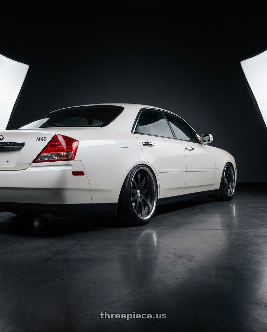 2002 Infiniti M45 with Work Equip E10 5x108 20x10+-32 o disk Black Anodized wheels rear three quarter view slight stretch tires