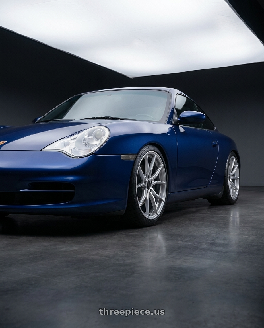 2002 Porsche 911 Carrera Blue with Advanti Racing 80S Hybris 5x114.3 18x8 +45 Silver with Machined Face wheels