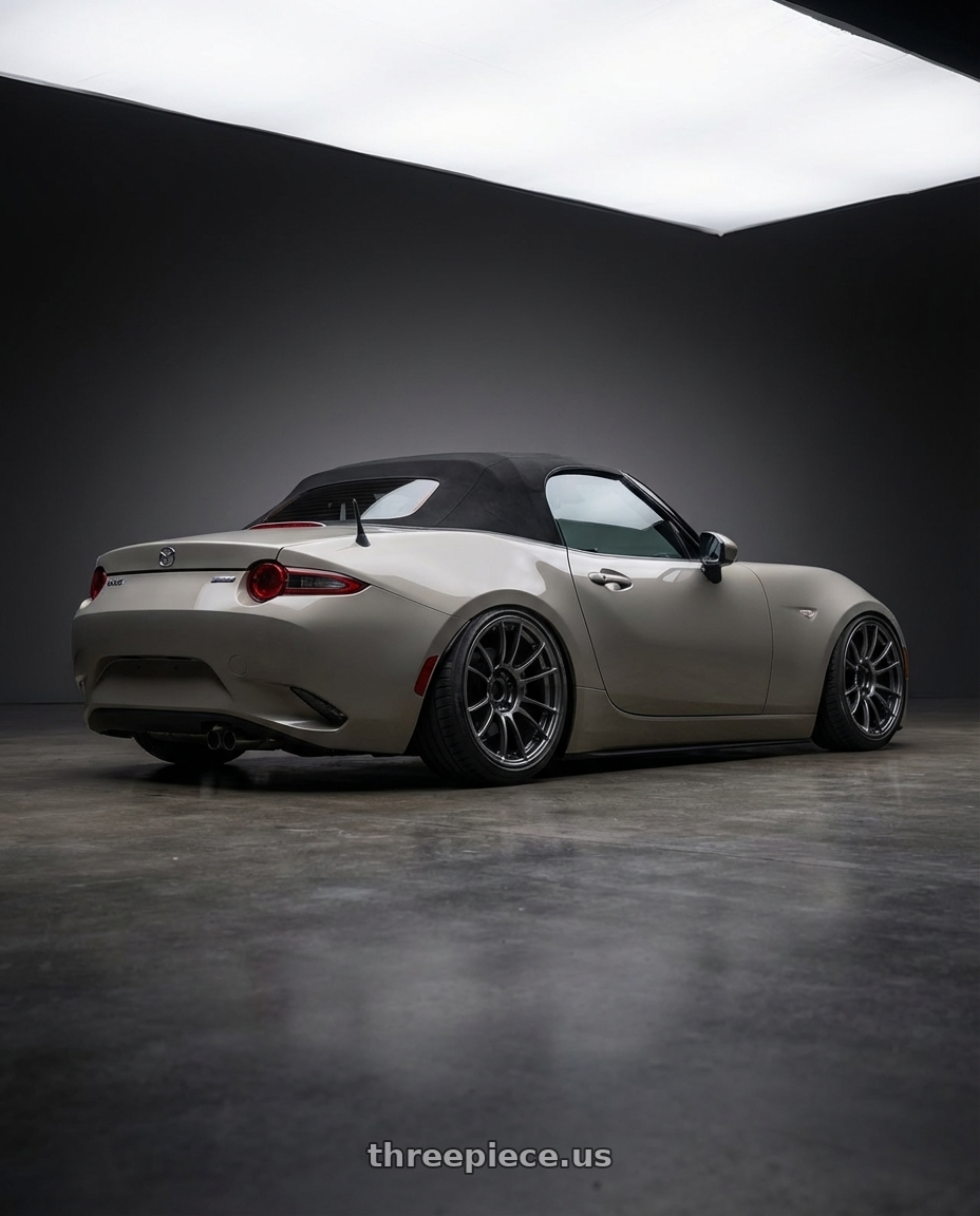 2021 Mazda MX-5 Miata ND with Ssr Gtx04 5x114.3 17x9+38  DARK GUNMETAL wheels rear three quarter view slight stretch tires